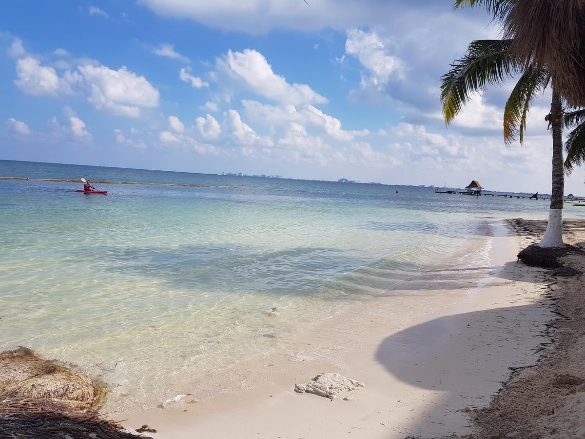 Suite frente al Mar Cancún Esterno foto