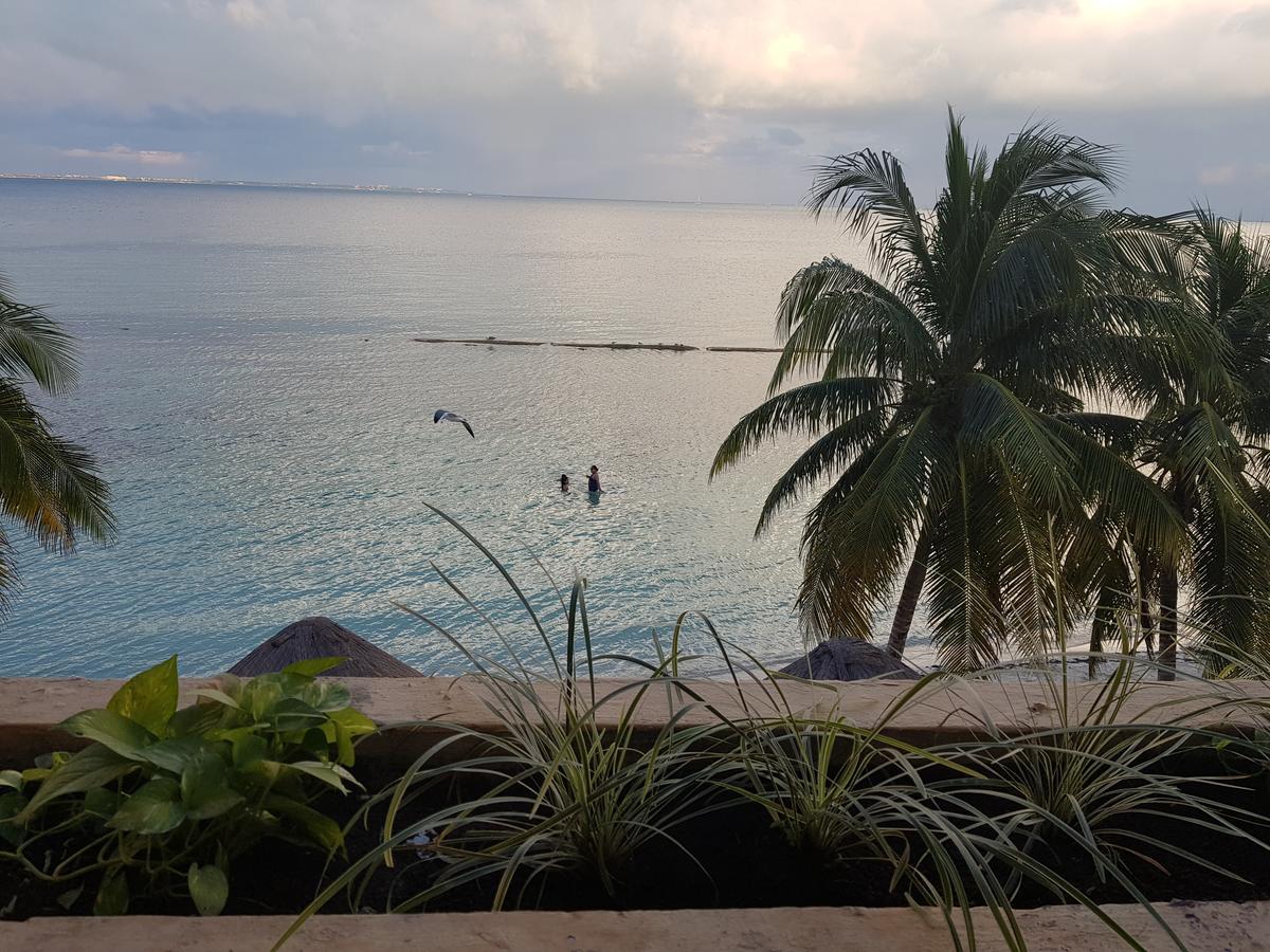 Suite frente al Mar Cancún Esterno foto