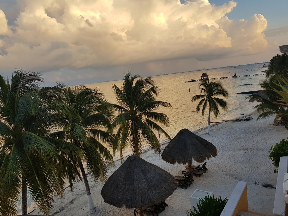 Suite frente al Mar Cancún Esterno foto