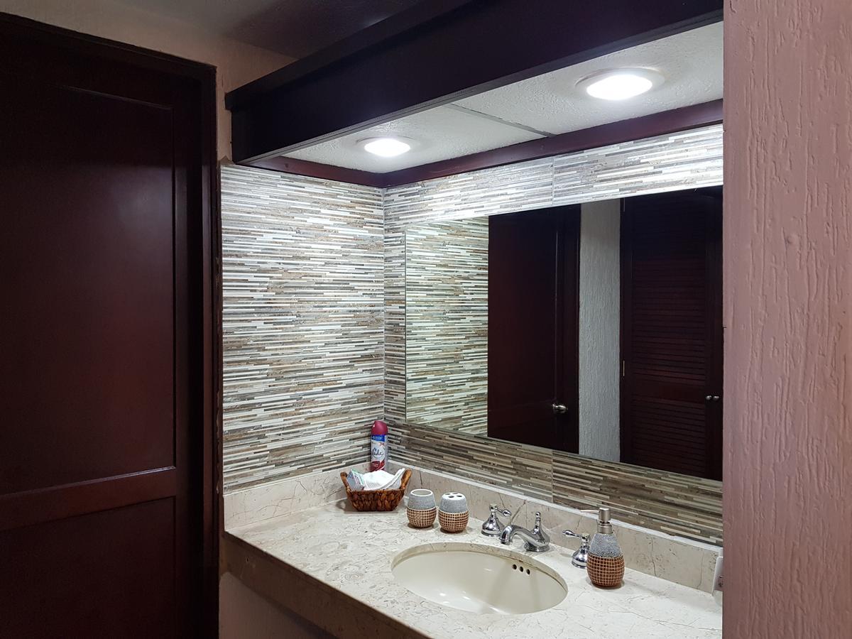 Suite frente al Mar Cancún Esterno foto