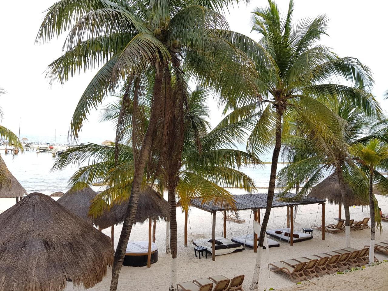 Suite frente al Mar Cancún Esterno foto