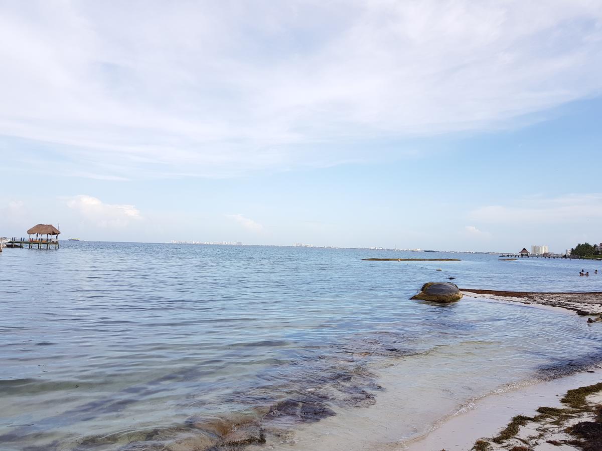 Suite frente al Mar Cancún Esterno foto